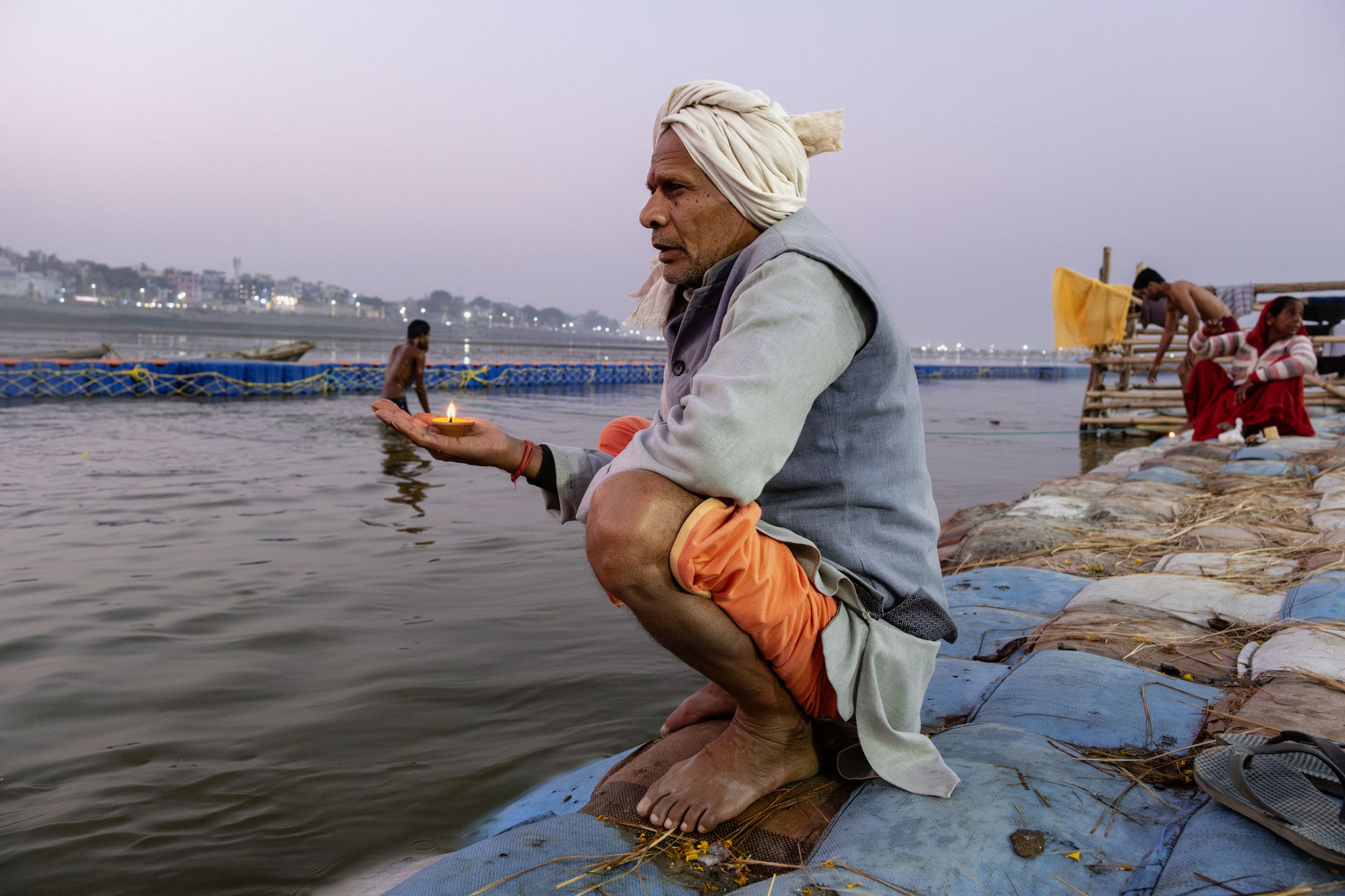 A man pray at Ganga river in Kumph Mela Festival at Prayagraj, India 2 February 2025